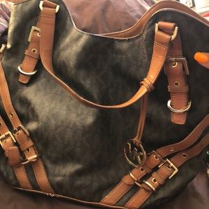 Two Michael Kors purses